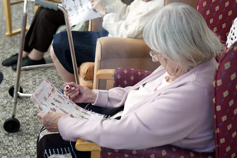 An elderly woman in a care home.