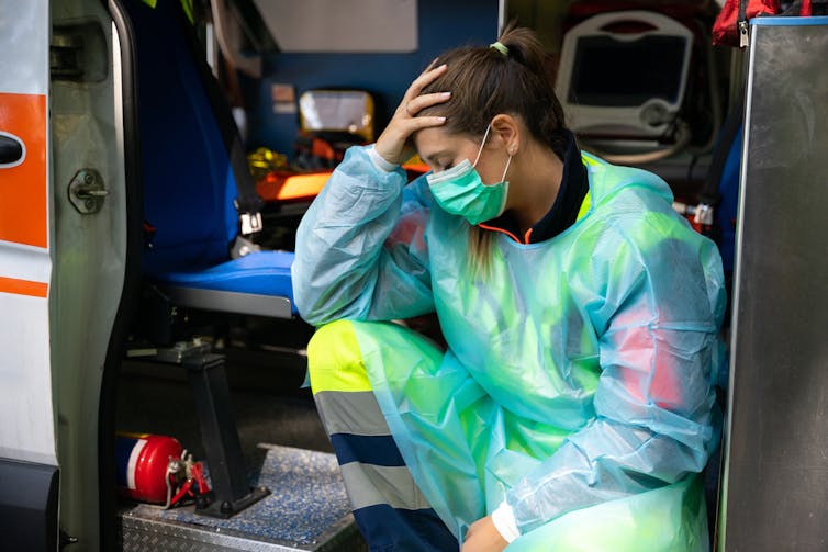 A young paramedic looking exhausted