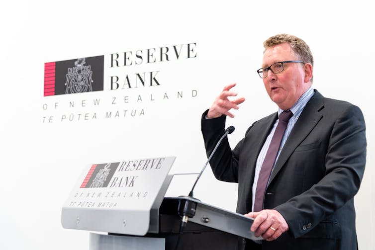 Reserve Bank of NZ governor Adrian Orr speaking at a lecturn