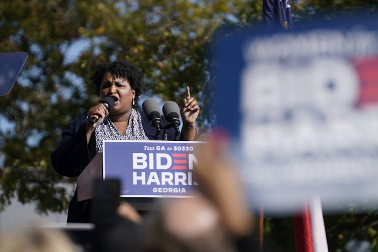 Democrat organiser Stacey Abrams speaks at a rally.
