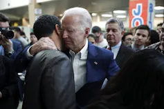 Biden hugs a supporter.