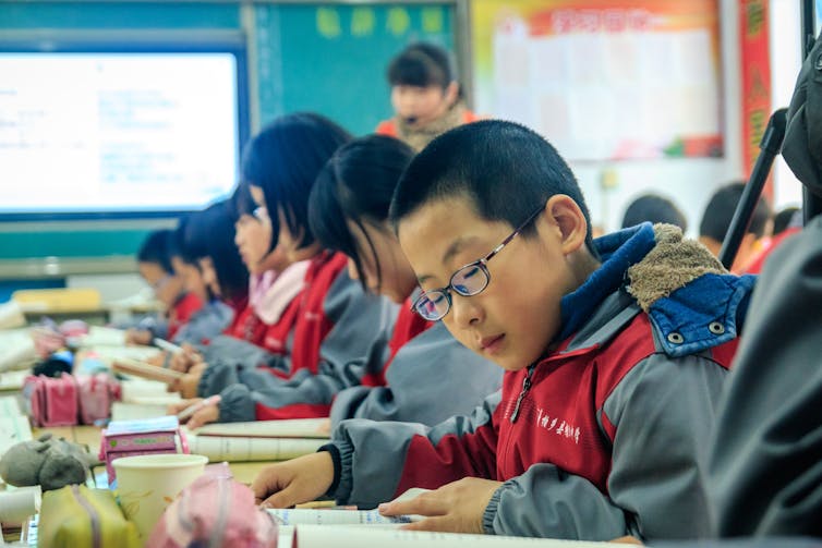 Children in middle school in China.