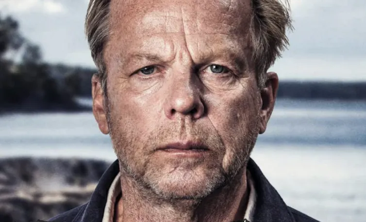 Man's face, lined and wizened