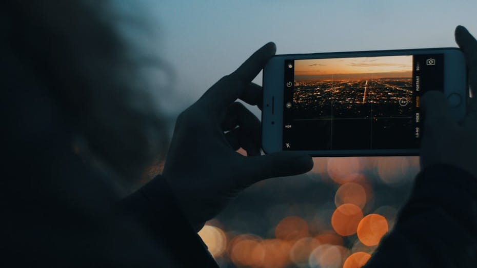 The Los Angeles skyline seen on a smartphone.