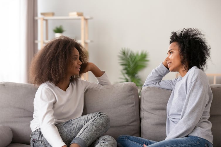 Mother and talking talking on the couch