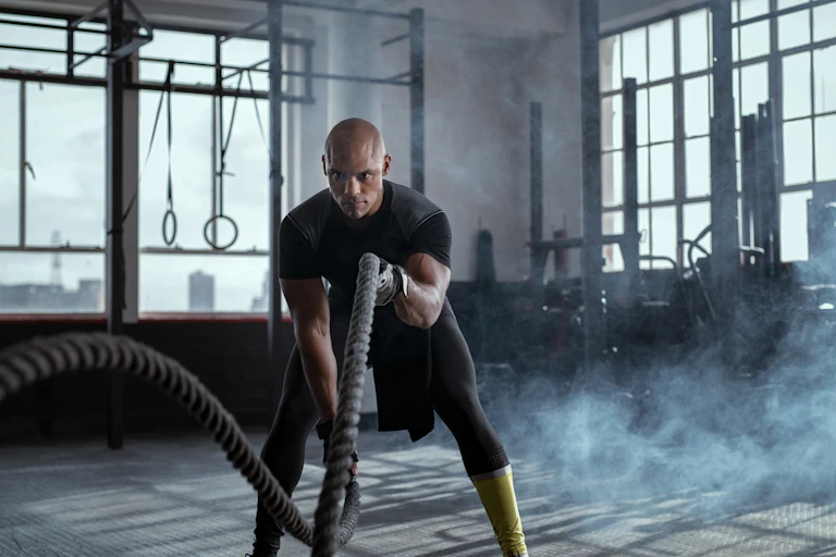 A man focuses while in the gym.
