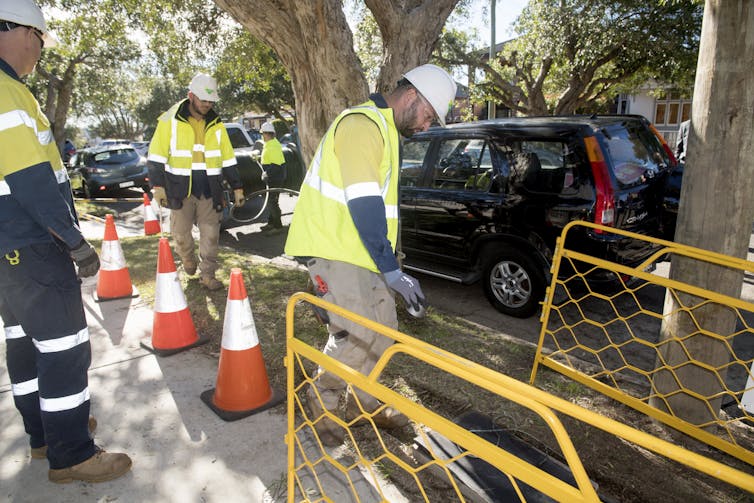 Contractors roll out the NBN network in Sydney in July 2017.