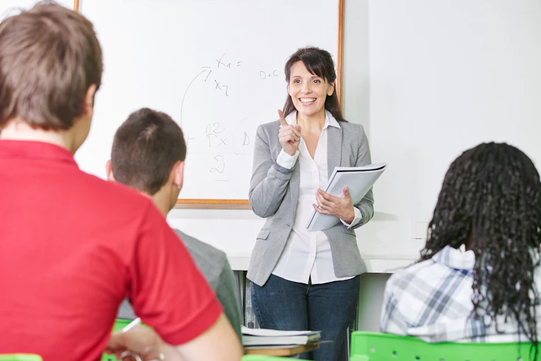 Teacher in front of secondary pupils