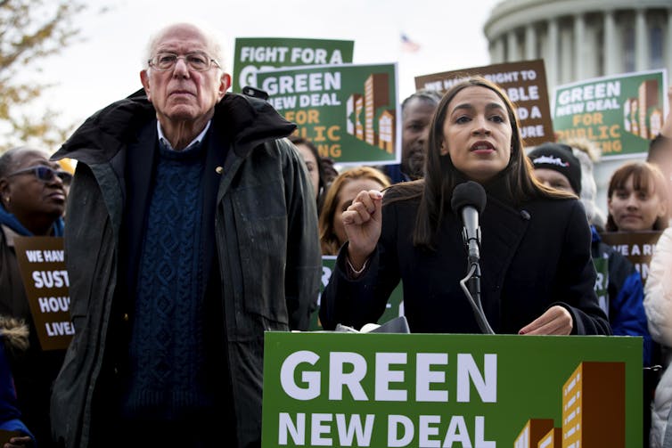 Bernie Sanders and AOC at a Green New Deal rally.