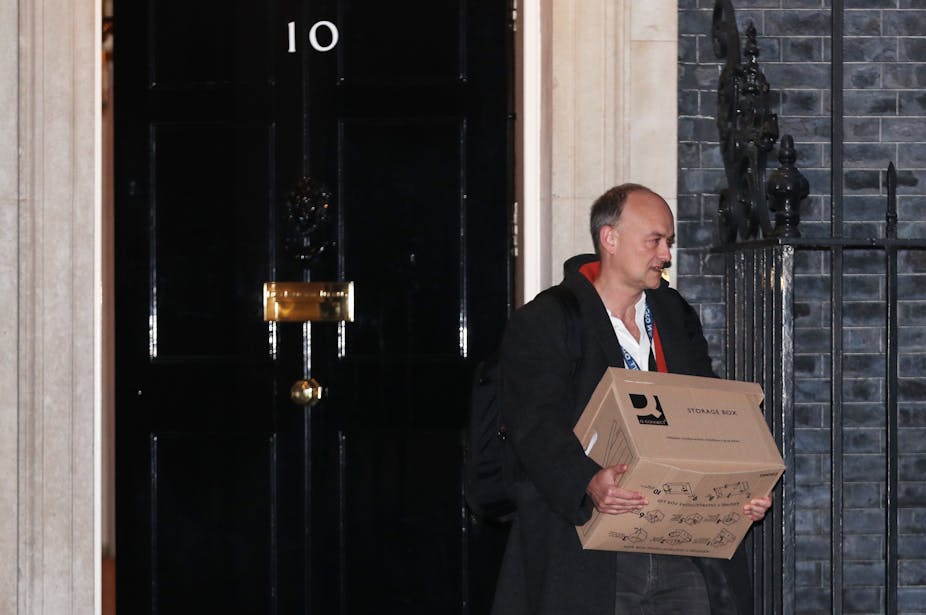Dominic Cummings leaving 10 Downing Street with a box of possessions.
