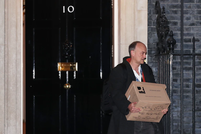 Dominic Cummings leaving 10 Downing Street with a box of possessions.