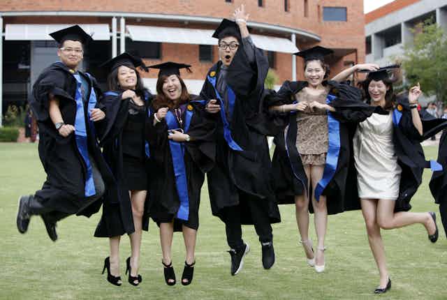 Chinese students celebrate graduation from university
