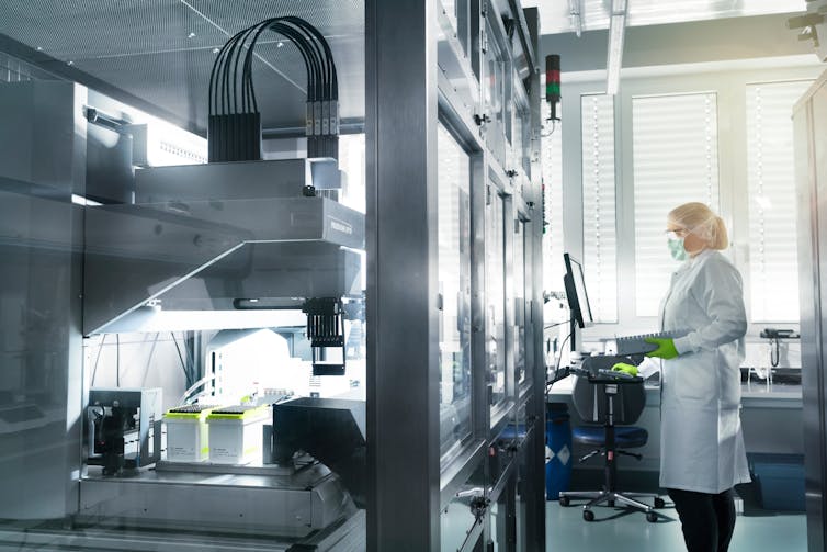 A technician working on the Pfizer/BioNTech vaccine at
a BioNTech facility