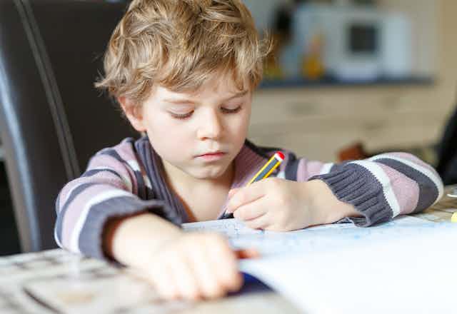 A boy writing
