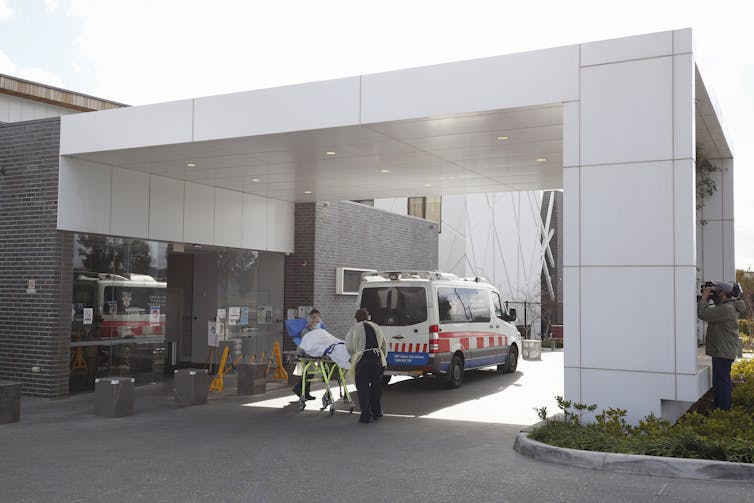 ambulance picks up patient at aged care home