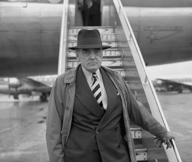 Lord Reith about to board a flight to South Africa in 1956.