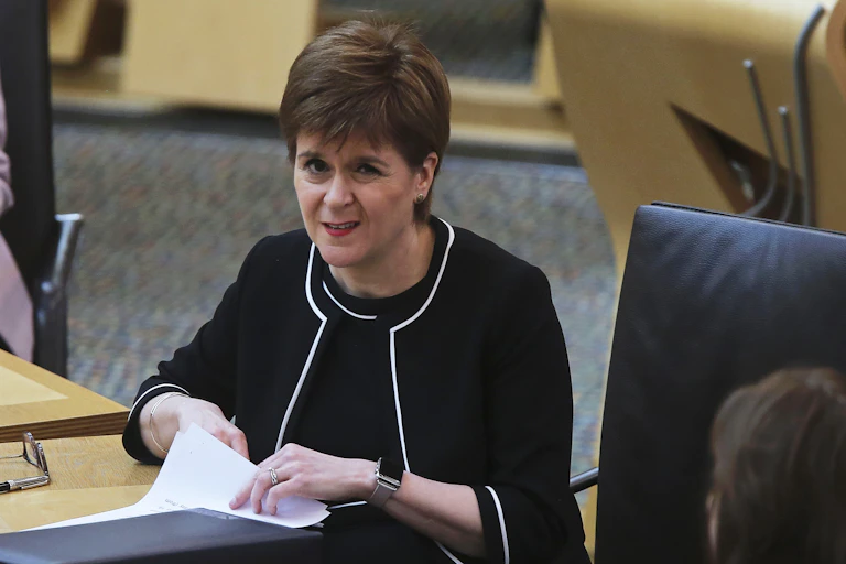 Nicola Sturgeon frowning at the camera.