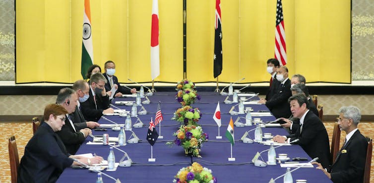 Morrison's Japan trip yields defence pact, but travel bubble less certain