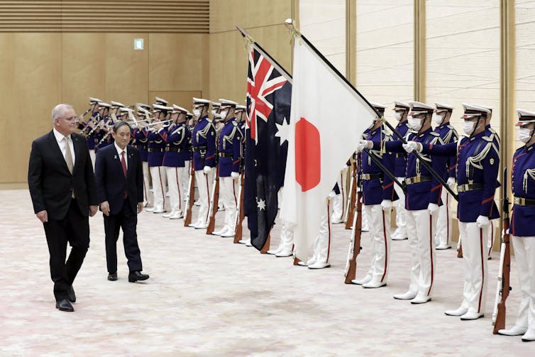 Morrison's Japan trip yields defence pact, but travel bubble less certain