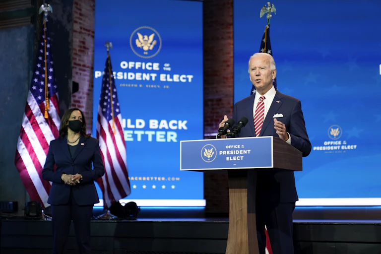 Joe Biden giving a speech behind a podium