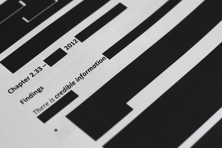 A page from the Brereton report, heavily redacted