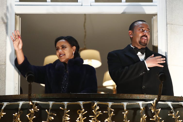 Ethiopian prime minister Abiy Ahmed and his wife Zinash Tayachew wave to photographers in Oslo, Norway, December 2019.