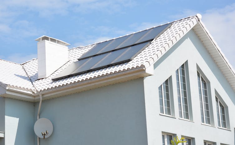 A house with solar panels on the roof.