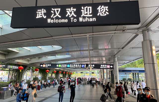 A sign at a train station welcoming people to Wuhan. 