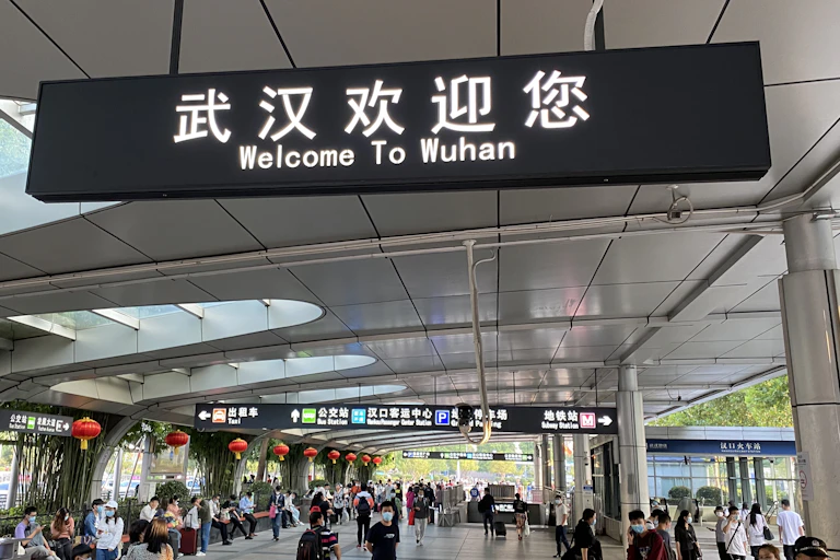 A sign at a train station welcoming people to Wuhan.