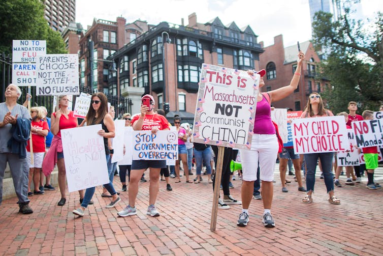 Recent polls say nearly half of Americans won't take the COVID-19 vaccine.