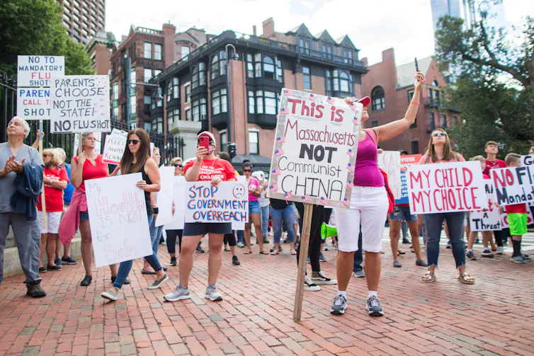 Recent polls say nearly half of Americans won't take the COVID-19 vaccine.