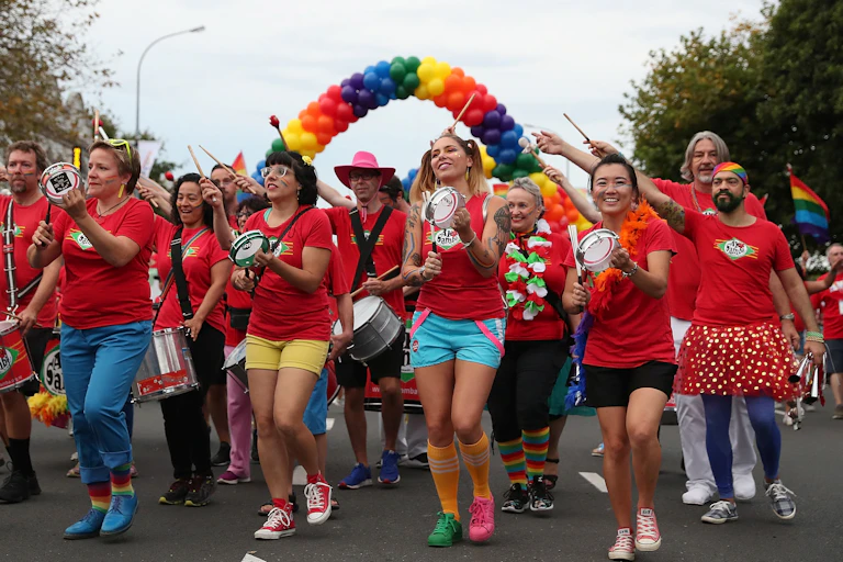 People taking part in a pride parade.