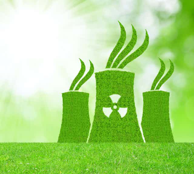 Three nuclear cooling towers made of grass