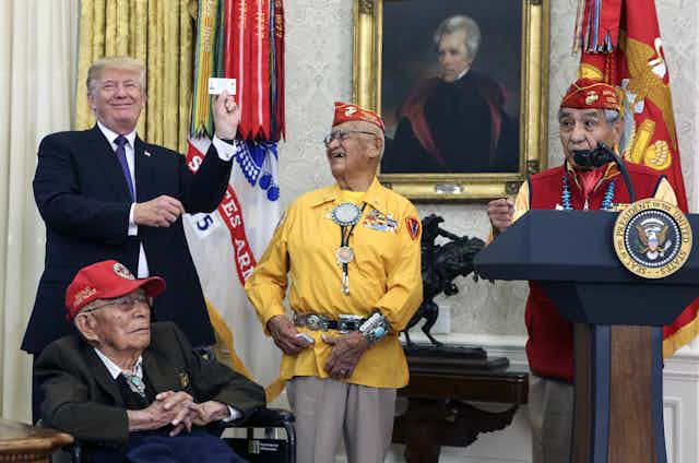 US president Donald Trump at the White House with veterans of the Native American code talkers, November 2017.
