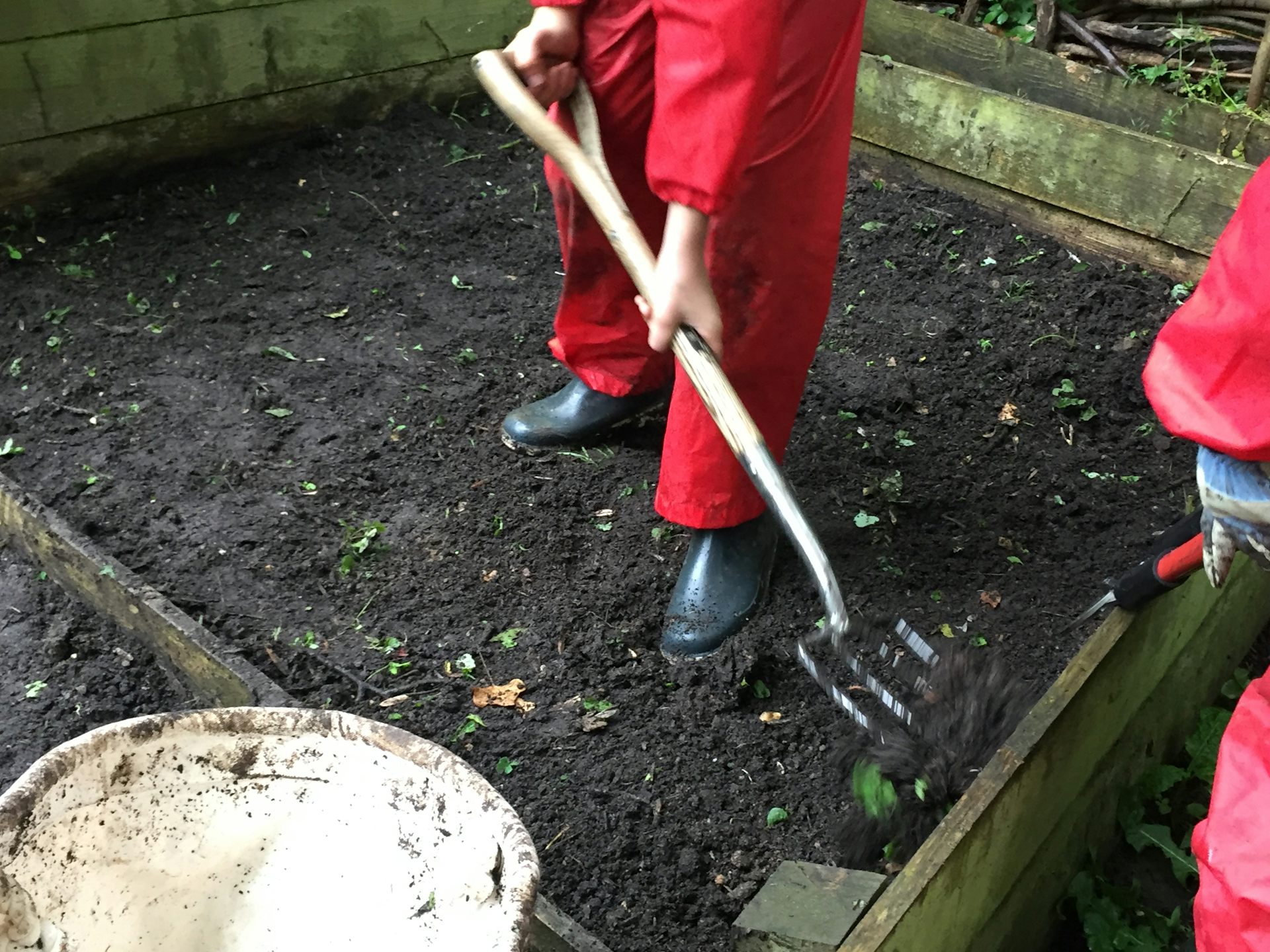 Child digging with a fork