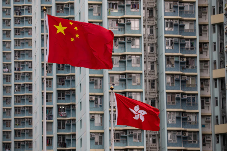 China's flag flies above Hong Kong's outside the West Kowloon Law Courts building in Hong Kong.