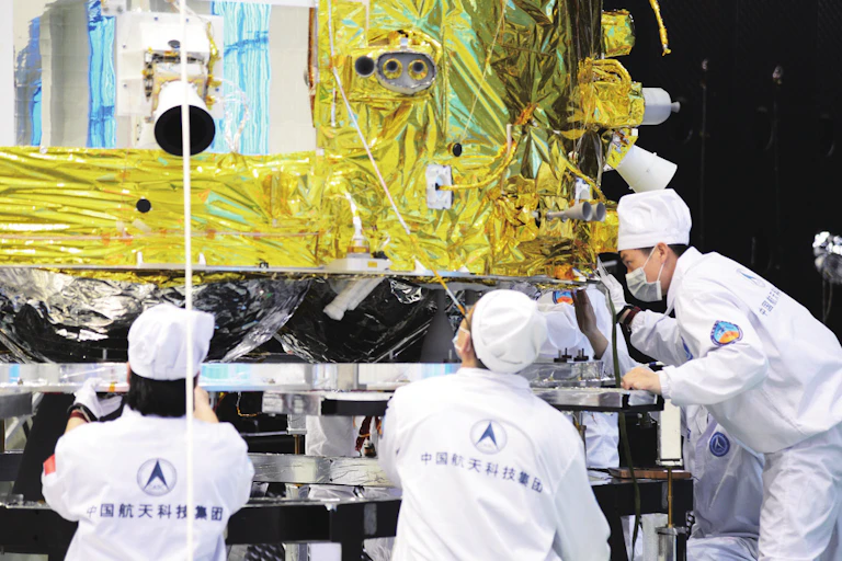 Image of the Chang’e 5 orbiter-return capsule being assembled.