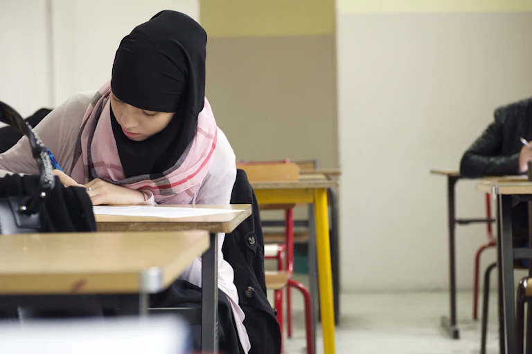Muslim students are pictured in their classroom at the La Reussite school.