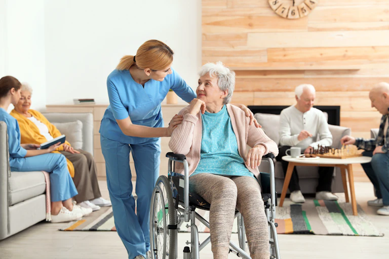 Nurse with residents in an aged care home