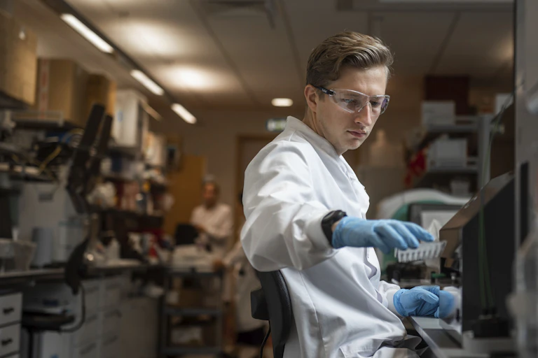 Researcher works on a COVID vaccine