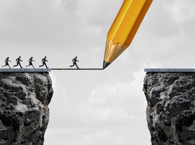 A pencil drawing a bridge between two chasms, with people running over it.