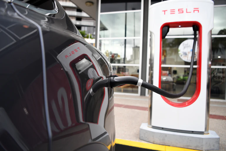 Electric car at charging station