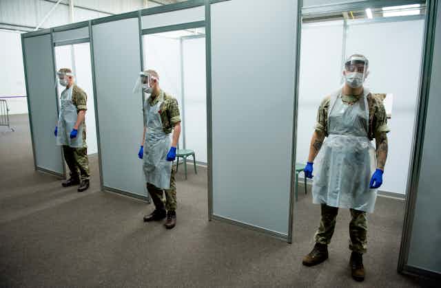 British Army soldiers prepare to offer a COVID-19 tests as part of Operation Moonshot in Wavertree Tennis centre, Liverpool, England.