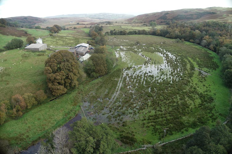 An aerial view of a flooded field.