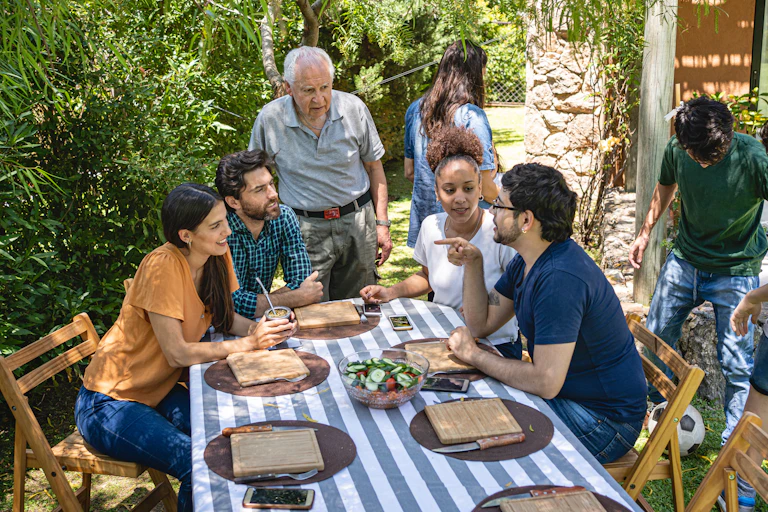 people at an outdoor meal