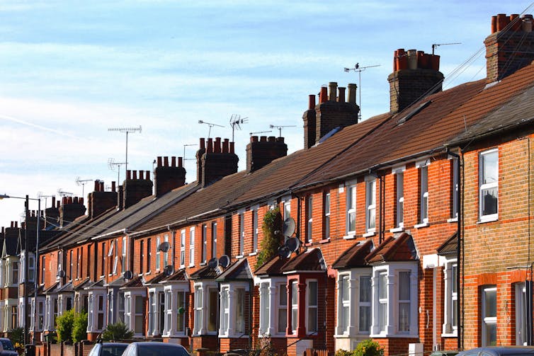 Row of terraced brick houses.