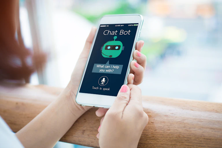 Person using chatbot on smartphone.
