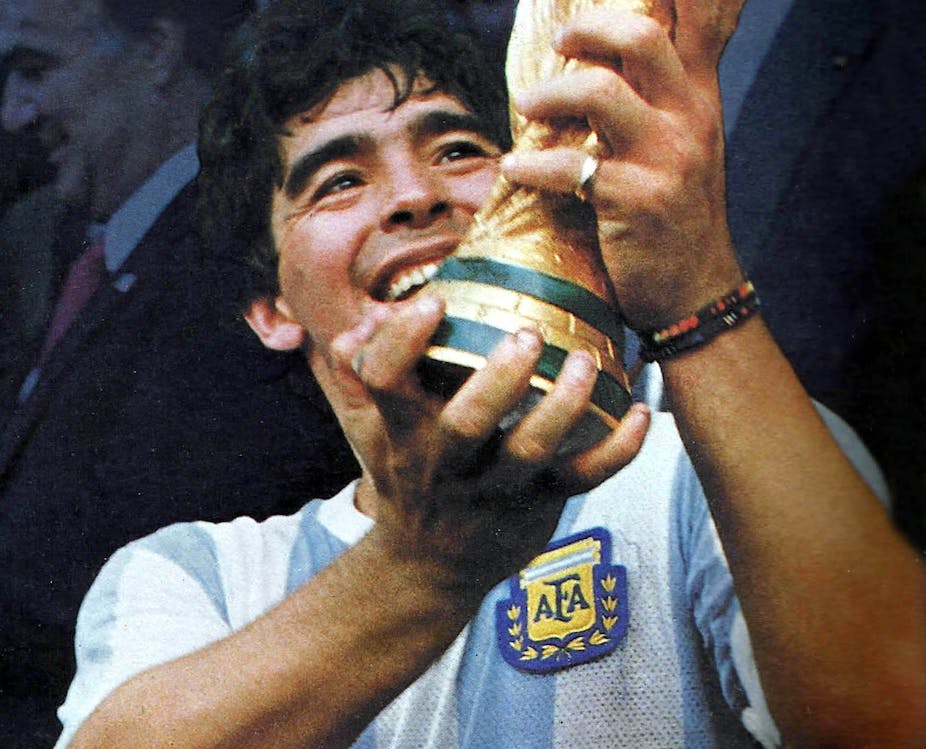 Diego Maradona with the World Cup, 1986.