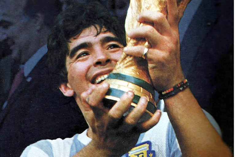 Diego Maradona with the World Cup, 1986.