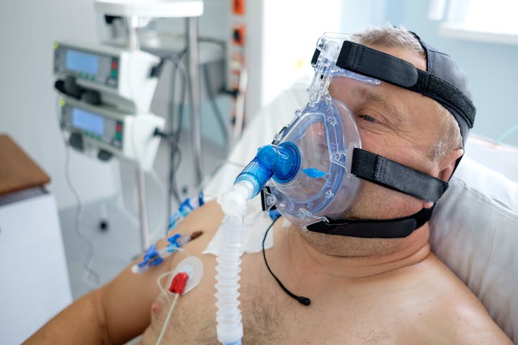 A man wearing a CPAP mask